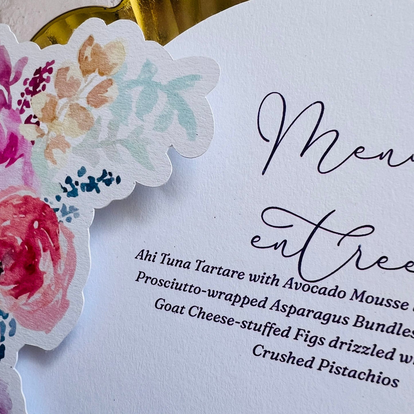 Menu card with floral design and text on a white background