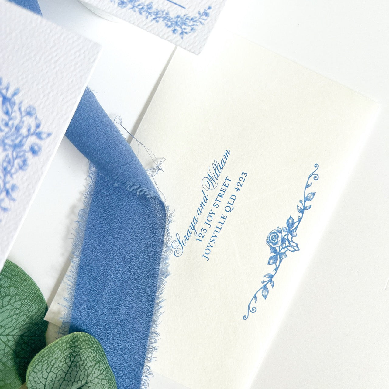EnchantedGardenblueandwhiteflowerweddinginvitation5