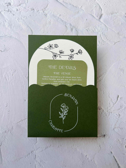 Green invitation card with white text and floral design on a light gray background