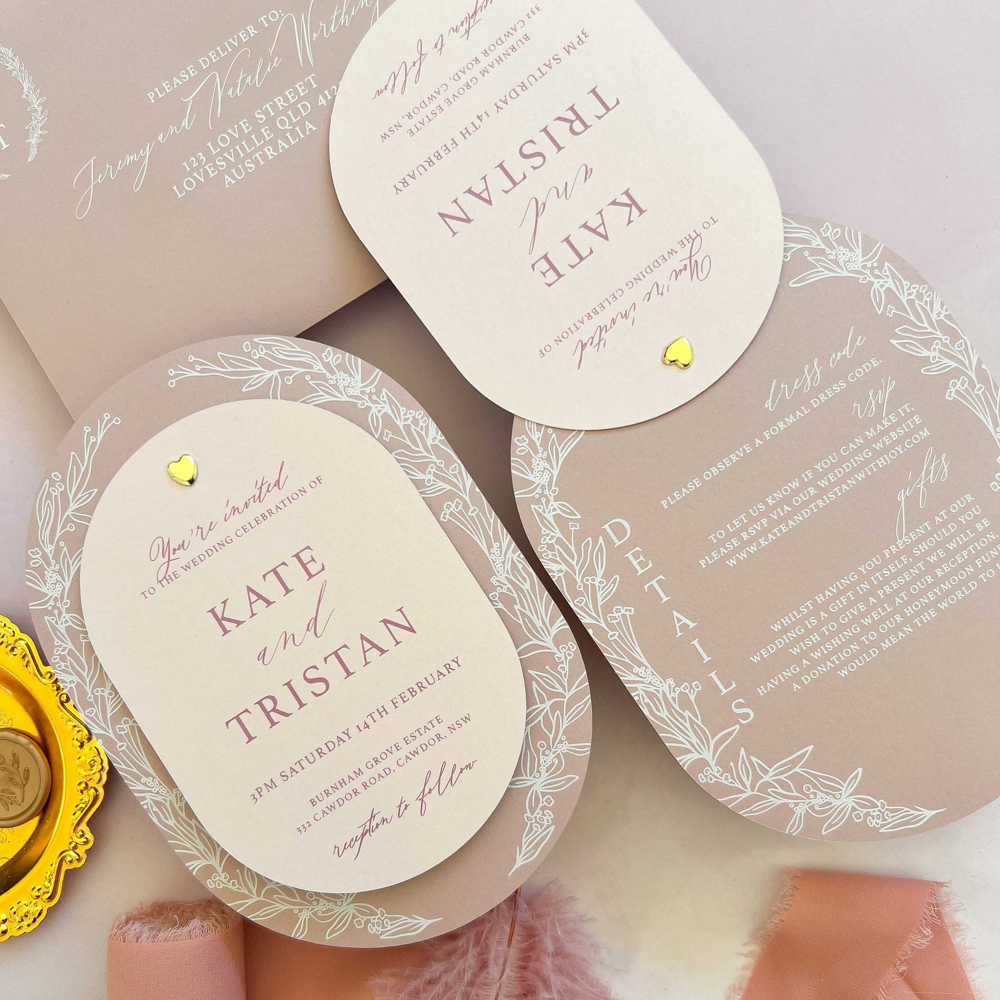 Wedding invitation cards with decorative elements on a soft background