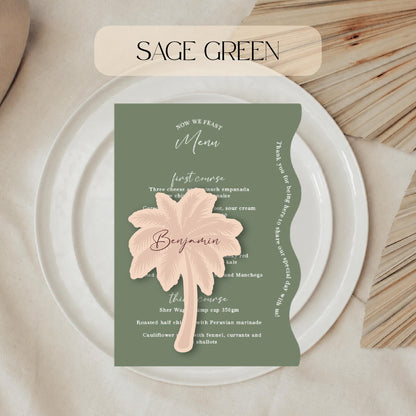 Sage green menu card with pink palm leaf design on a white plate.