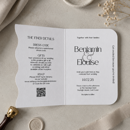 Wedding invitation card with RSVP details on a neutral background